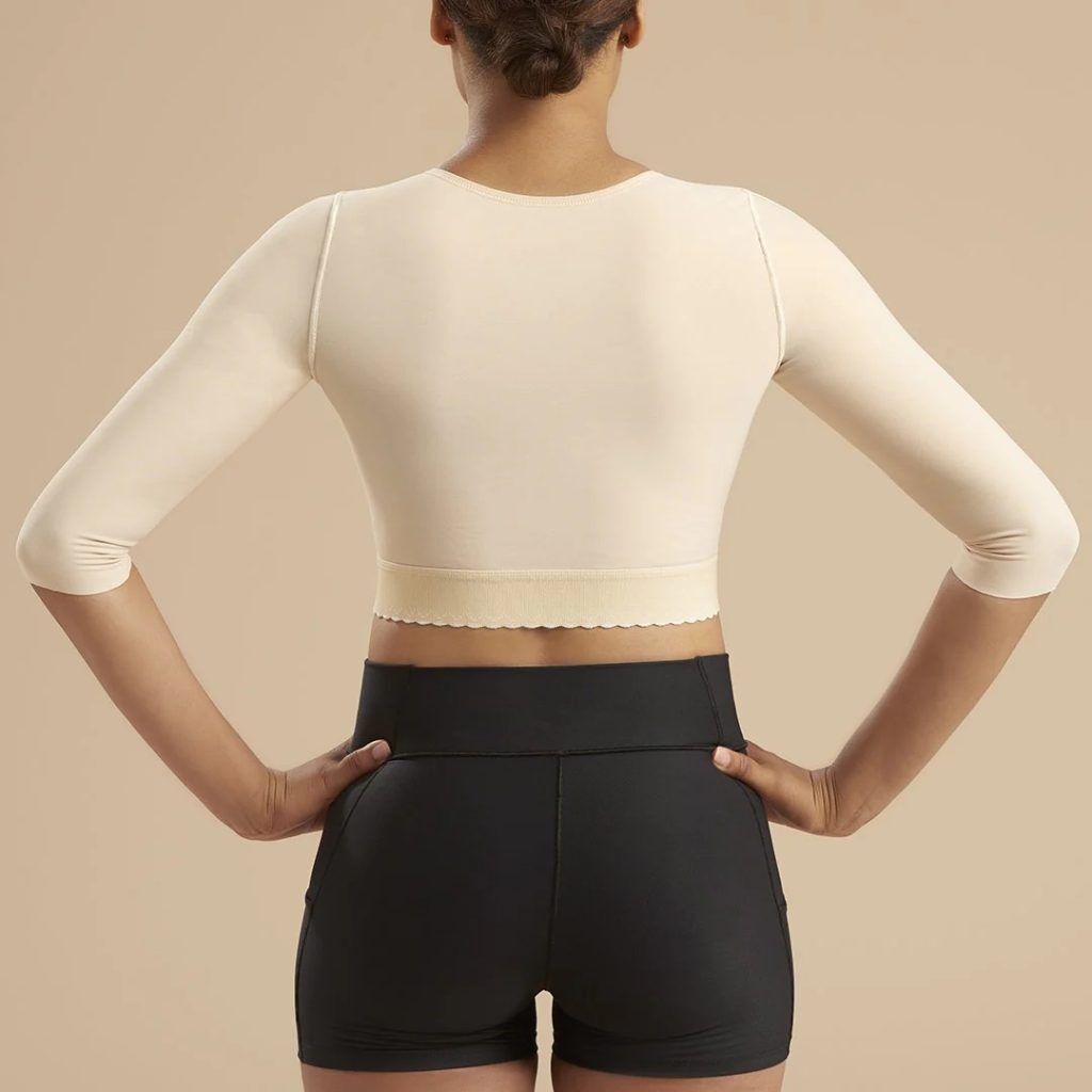 woman standing backwards